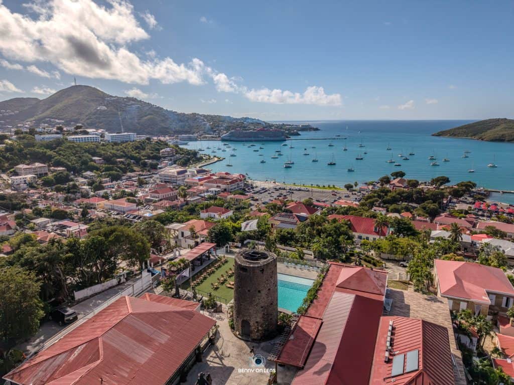 Fort and scenic ocean view in St. Thomas, showcasing lush landscapes and vibrant local architecture.