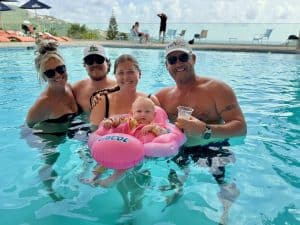 Family relaxing in the pool at Blackbeard's Castle in St. Thomas