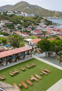 Blackbeard's Castle hilltop property with pool, lawn and Charlotte Amalie harbor views